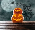 Two happy pumpkins in Halloween dark night. Royalty Free Stock Photo