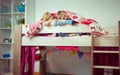 Two happy sibling children having fun in bunk bed Royalty Free Stock Photo