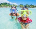 Two happy kids in diving masks having fun on the beach Royalty Free Stock Photo