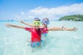 Two happy kids in diving masks having fun on the beach Royalty Free Stock Photo