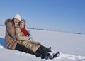 Two happy sisters sledding Royalty Free Stock Photo