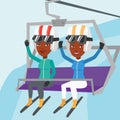Two happy skiers using cableway at ski resort.