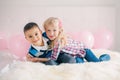 Two happy smiling white Caucasian cute adorable funny children. Boy and girl Royalty Free Stock Photo