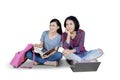 Two happy students studying together on studio Royalty Free Stock Photo