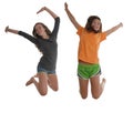 Two happy teenage girls jumping air