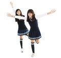 happy teenager student girls dancing