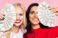 Two happy women covering their half faces Royalty Free Stock Photo