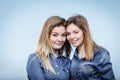 Two happy women friends wearing jeans outfit Royalty Free Stock Photo