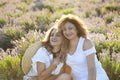 Middle age woman with her adult daughter in sunset light Royalty Free Stock Photo