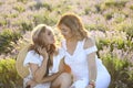 Middle age woman with her adult daughter in sunset light Royalty Free Stock Photo