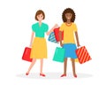 Two happy women with shopping bags.