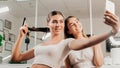 Women take a selfie in a beauty salon