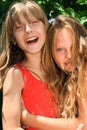 Two happy young blond girls Royalty Free Stock Photo