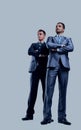 Two happy young businessmen full body, isolated on white. Royalty Free Stock Photo