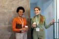 Young businesswomen taking a coffee break while working together Royalty Free Stock Photo