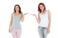 Two happy young female friends holding out their hands Royalty Free Stock Photo