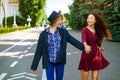 Two Happy Young Girls Hug Each Other In Summer Park Royalty Free Stock Photo