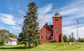 Two Harbors Lighthouse on a Knoll of Grassy Lawn