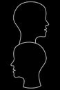 Two head silhouettes opposing Perspectives