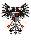 Two-headed heraldic eagle with a shield Royalty Free Stock Photo
