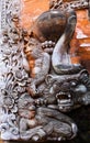 Two-headed lion and snake statue with intricate detail in Ubud, Bali