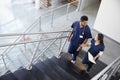 Two healthcare colleagues talking on the stairs at hospital Royalty Free Stock Photo