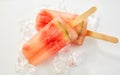 Two healthy frozen watermelon popsicles