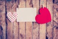 Two heart hanging and paper on clothesline and rope with wooden Royalty Free Stock Photo