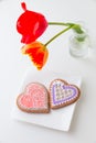 Two heart shape cookies on white plate. Royalty Free Stock Photo