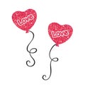 Two heart-shaped balloons with a red glitter texture, love inscription and curly ribbon for festive design Royalty Free Stock Photo