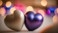 two heart shaped chocolates sitting next to each other on a table with blurry lights in the backround behind them and a blurry Royalty Free Stock Photo