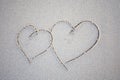 Two hearts at the beach Royalty Free Stock Photo