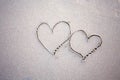 Two hearts at the beach Royalty Free Stock Photo