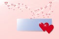 Two hearts and blue rectangle on trendy pink background Royalty Free Stock Photo