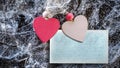 Two hearts on broken ice. Tablet for text. Mockup. Valentine`s Day.. Royalty Free Stock Photo