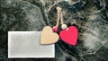 Two hearts on broken ice. Tablet for text. Mockup. Valentine`s Day. Royalty Free Stock Photo