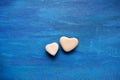 Two hearts candy jelly beans valentine`s blue backg