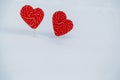 Two hearts-candy in the snow. the concept of Declaration of love and sweets, Valentine`s Day. A sweet symbol of love Royalty Free Stock Photo