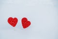 Two hearts-candy in the snow. the concept of Declaration of love and sweets, Valentine`s Day. A sweet symbol of love Royalty Free Stock Photo