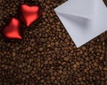 Two hearts on coffee covered background Royalty Free Stock Photo