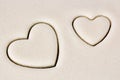 Two hearts on dough layer Royalty Free Stock Photo