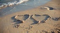 Two hearts drawn in the sand on a beach Royalty Free Stock Photo