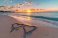 Two hearts drawn on sand of paradise beach at sunset Royalty Free Stock Photo