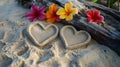 Two hearts drawn in the sand on a tropical beach Royalty Free Stock Photo