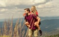 Two hearts full of love. Beautiful couple embracing landscape background. Couple in love summer vacation. Love and trust