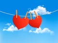 Two hearts hanging on a rope