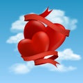 Two hearts hovering in clouds