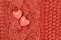 Two hearts knitted wool texture Valentines Day background