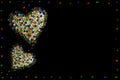 Two hearts made of colored artificial stones on black background. Christmas. Poem background. Valentine\'s Day. Copy space Royalty Free Stock Photo