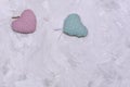 Two hearts made of fabric, pink and blue on gray textured background. Copy space for text. Concept for Valentine`s day, lovers, Royalty Free Stock Photo